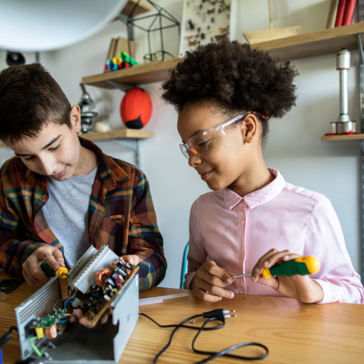 Students playing with electronics